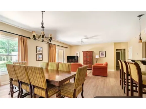 a view of a dining room with furniture