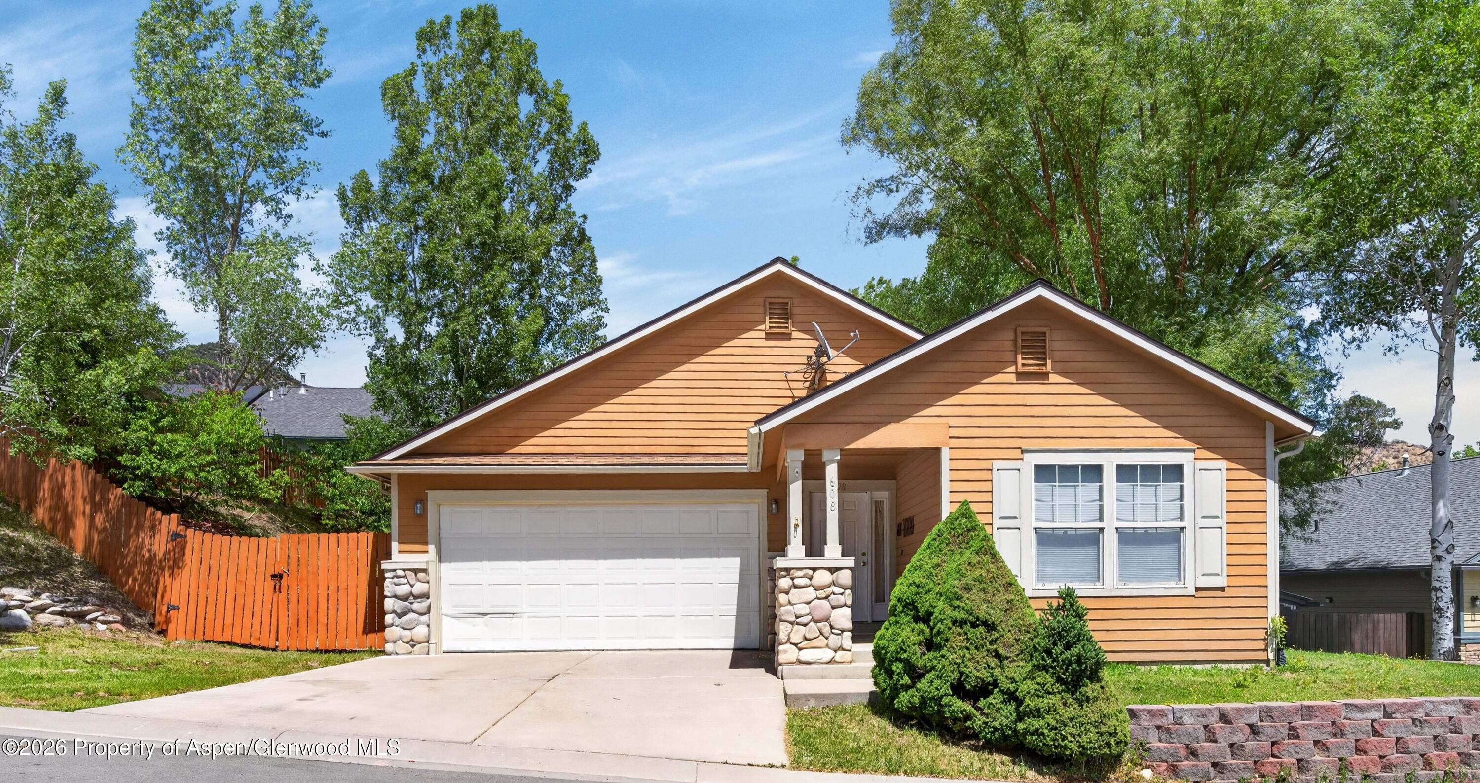 608 Lariat Loop New Castle, CO 81647 - Photo 32 of 32 a front view of a house with a yard and trees