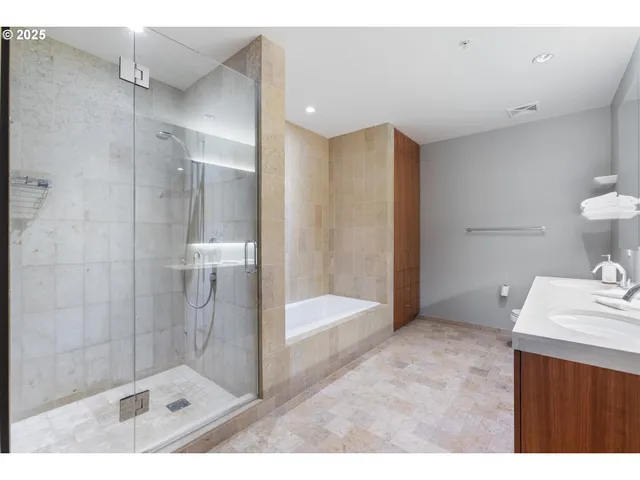 a living room with furniture and windows