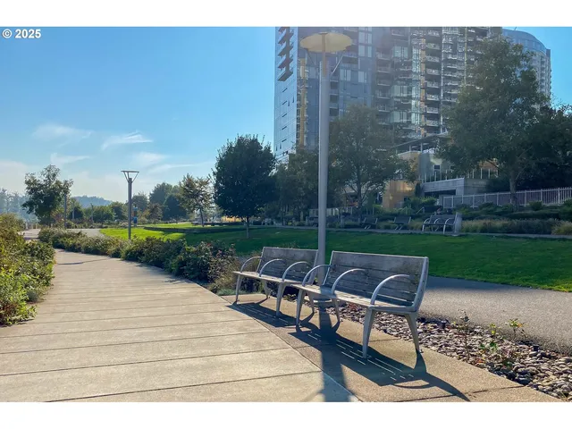 a view of house with outdoor space and sitting area