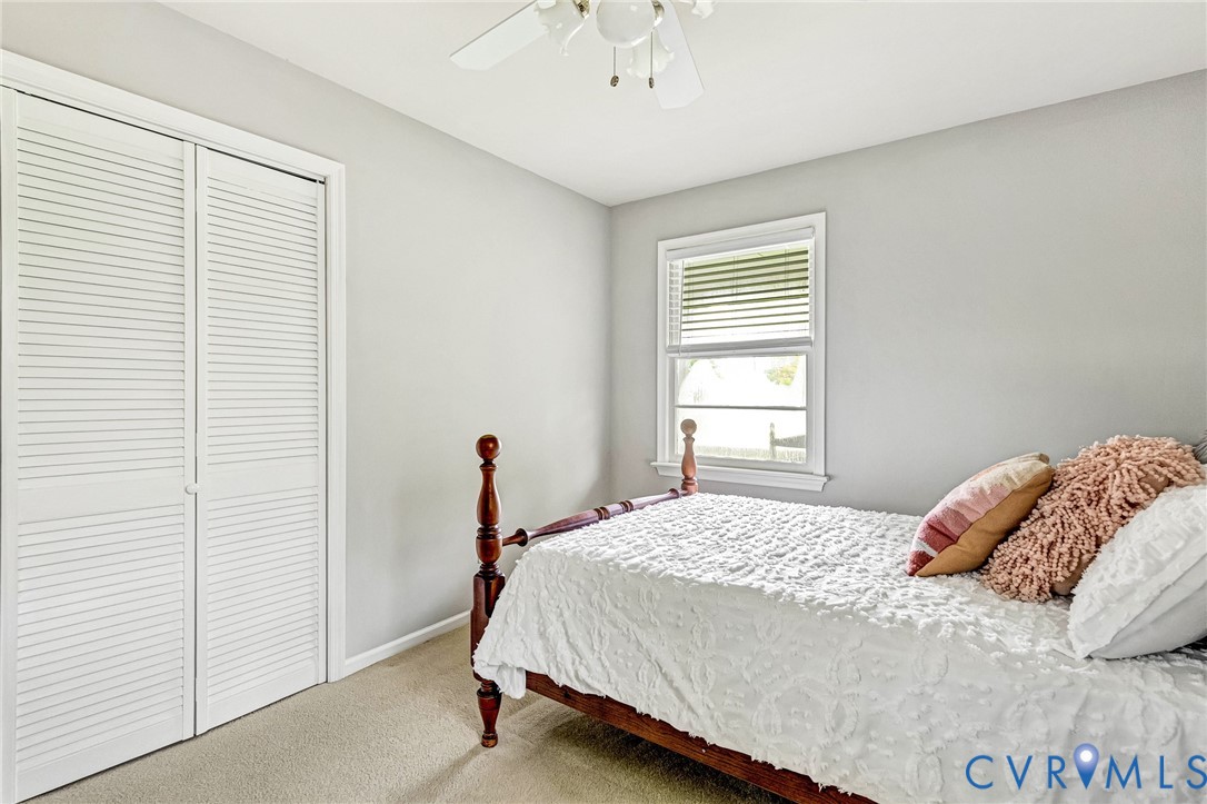 635 River Oaks Road Center Cross, VA 22437 - Photo 31 of 63 Neutral painted walls featuring a window with blin