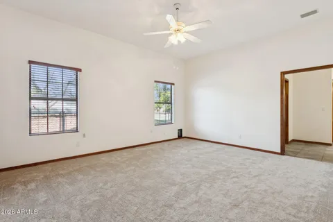 an empty room with fan