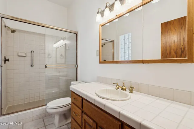 a view of an empty room with a fireplace