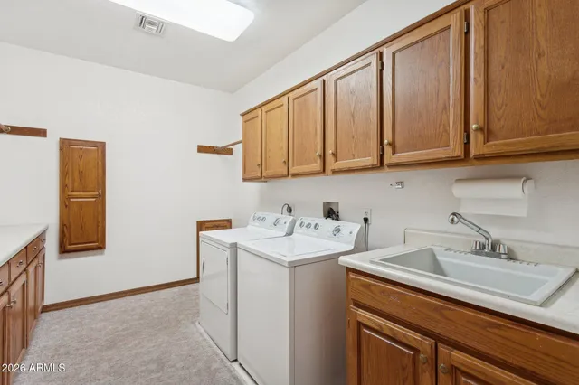 a view of dirt yard with a tree