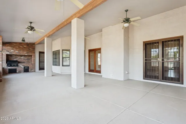 front view of a house with a large trees