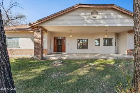 a sign board in front of a building