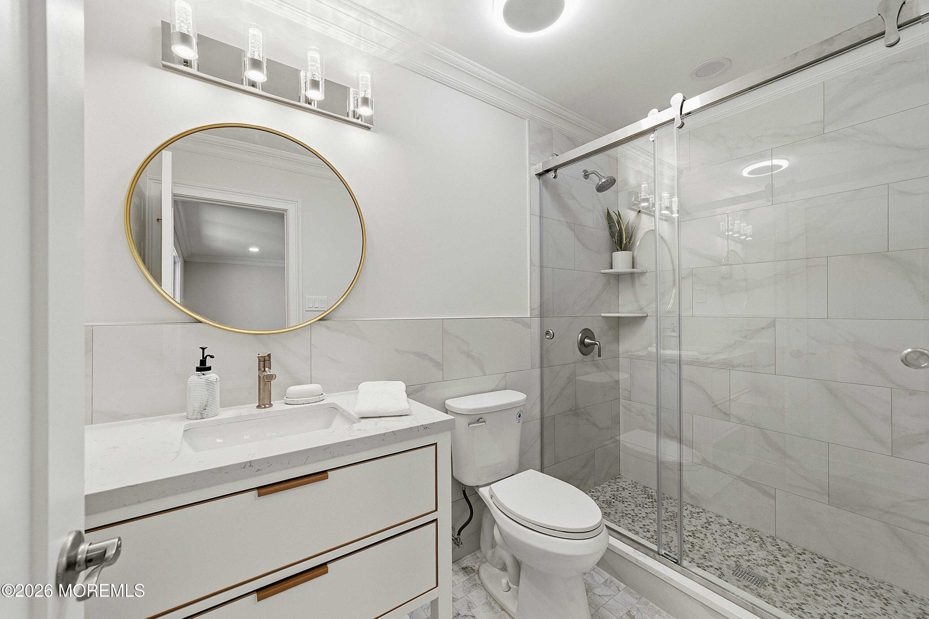 780 B Ardmore Road, Unit 780B Monroe Township, NJ 08831 - Photo 17 of 30 a bathroom with a toilet sink vanity granite and a mirror