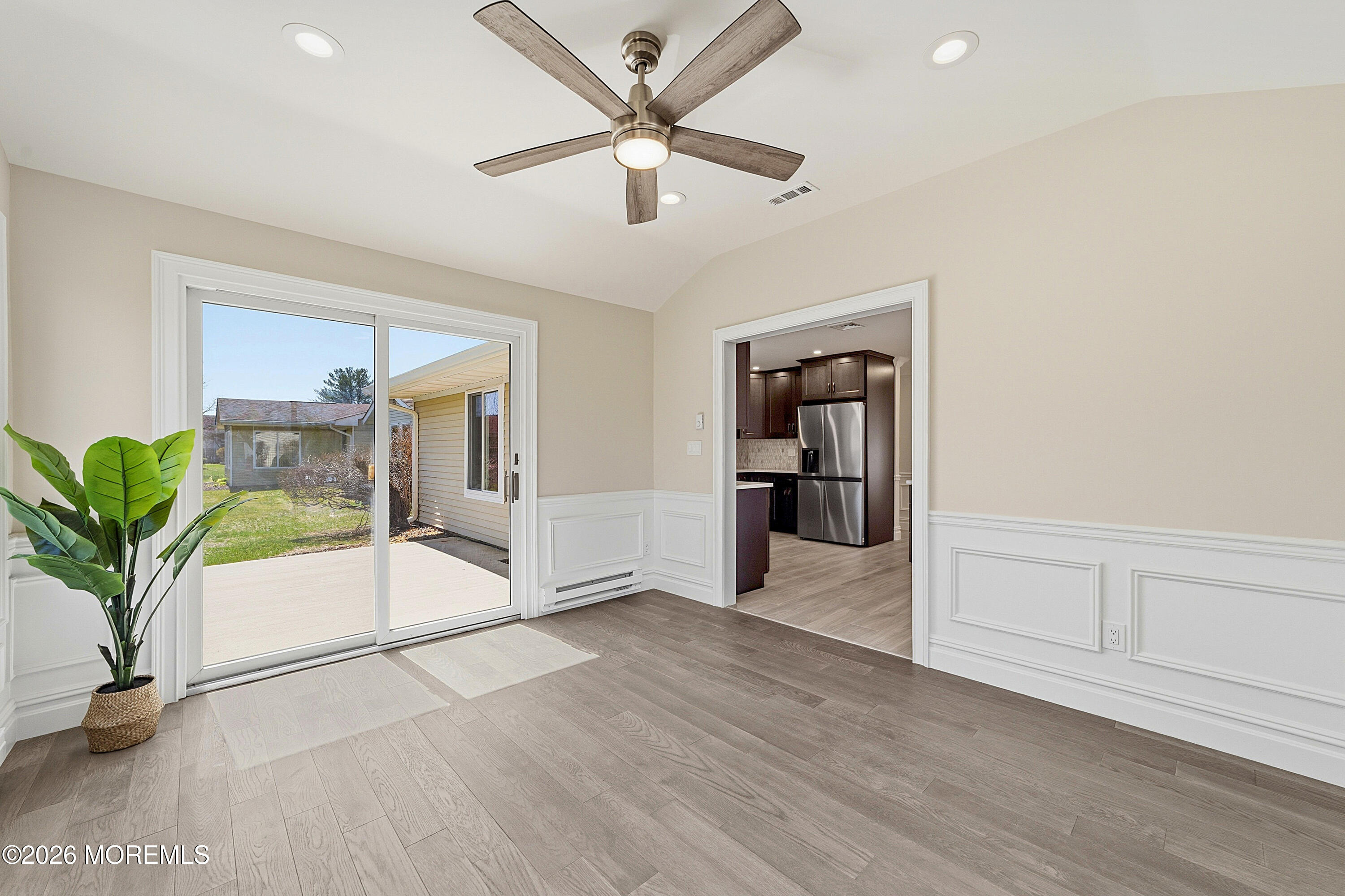 780 B Ardmore Road, Unit 780B Monroe Township, NJ 08831 - Photo 22 of 30 wooden floor in an empty room with a window