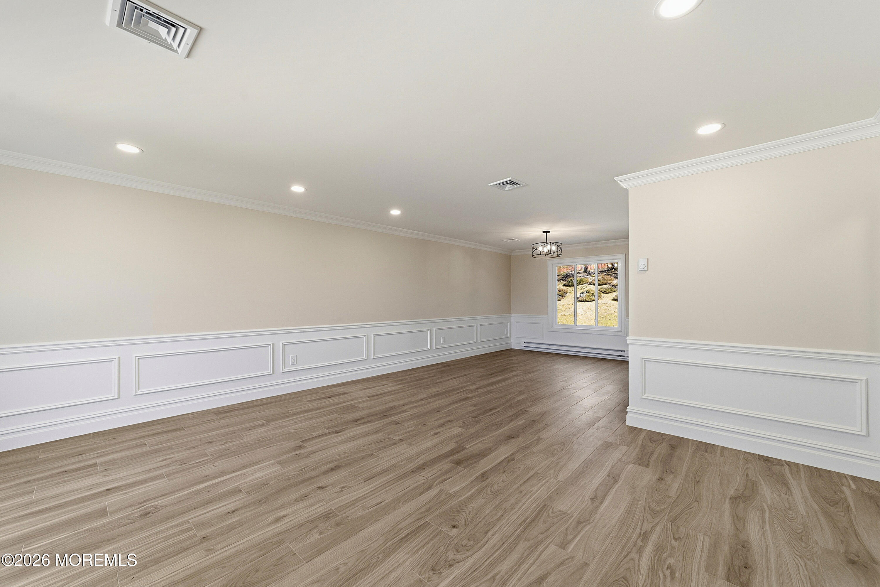 780 B Ardmore Road, Unit 780B Monroe Township, NJ 08831 - Photo 3 of 30 wooden floor in an empty room with a window