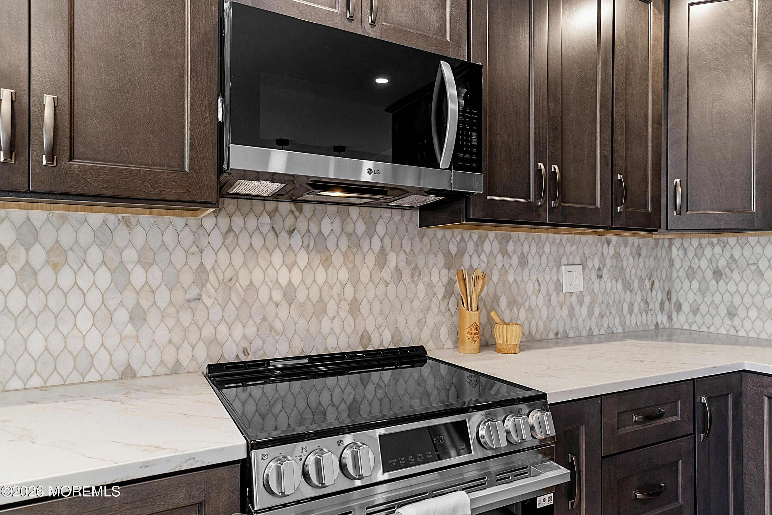 780 B Ardmore Road, Unit 780B Monroe Township, NJ 08831 - Photo 10 of 30 a kitchen with a stove and a microwave