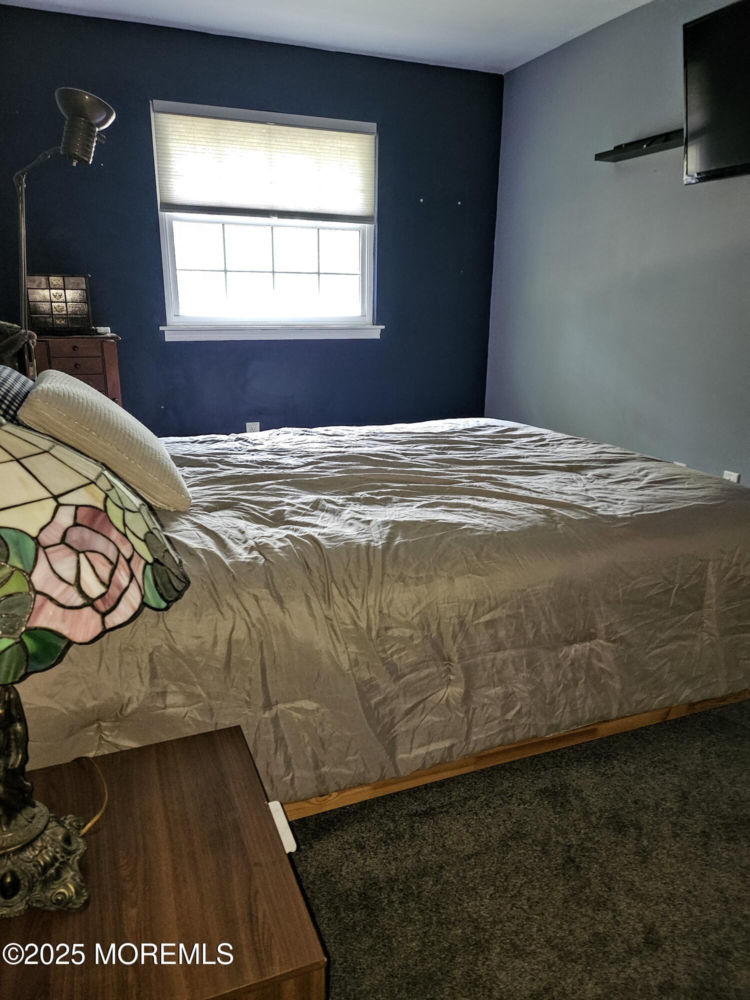 148 Oak Pines Boulevard Pemberton, NJ 08068 - Photo 34 of 38 a bedroom with a bed and a window