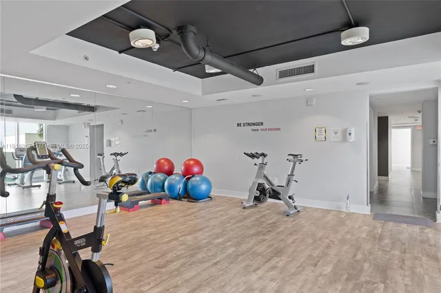 a view of a room with gym equipment