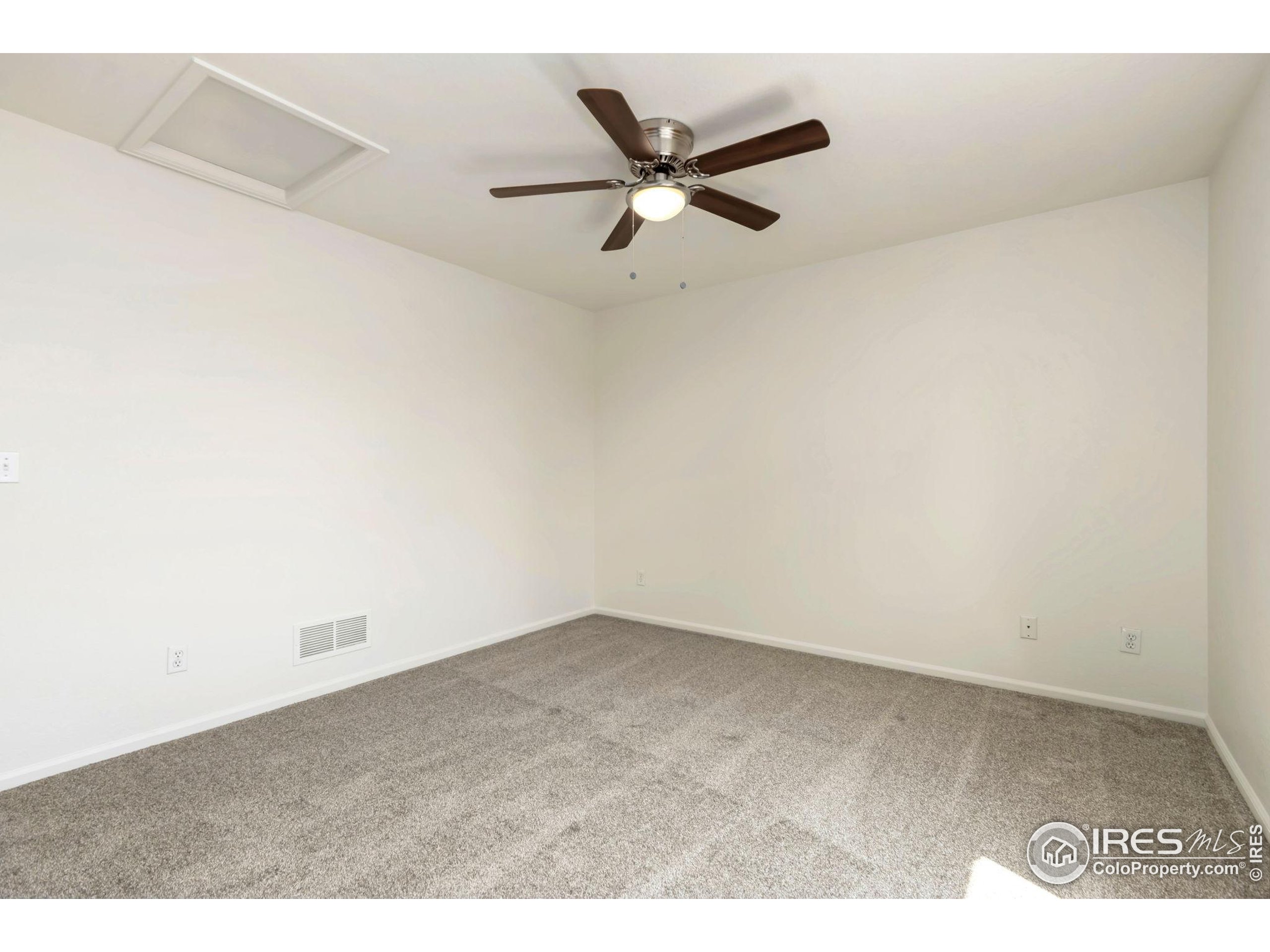 2925 West Stuart Street, Unit 11 Fort Collins, CO 80526 - Photo 16 of 34 a view of an empty room