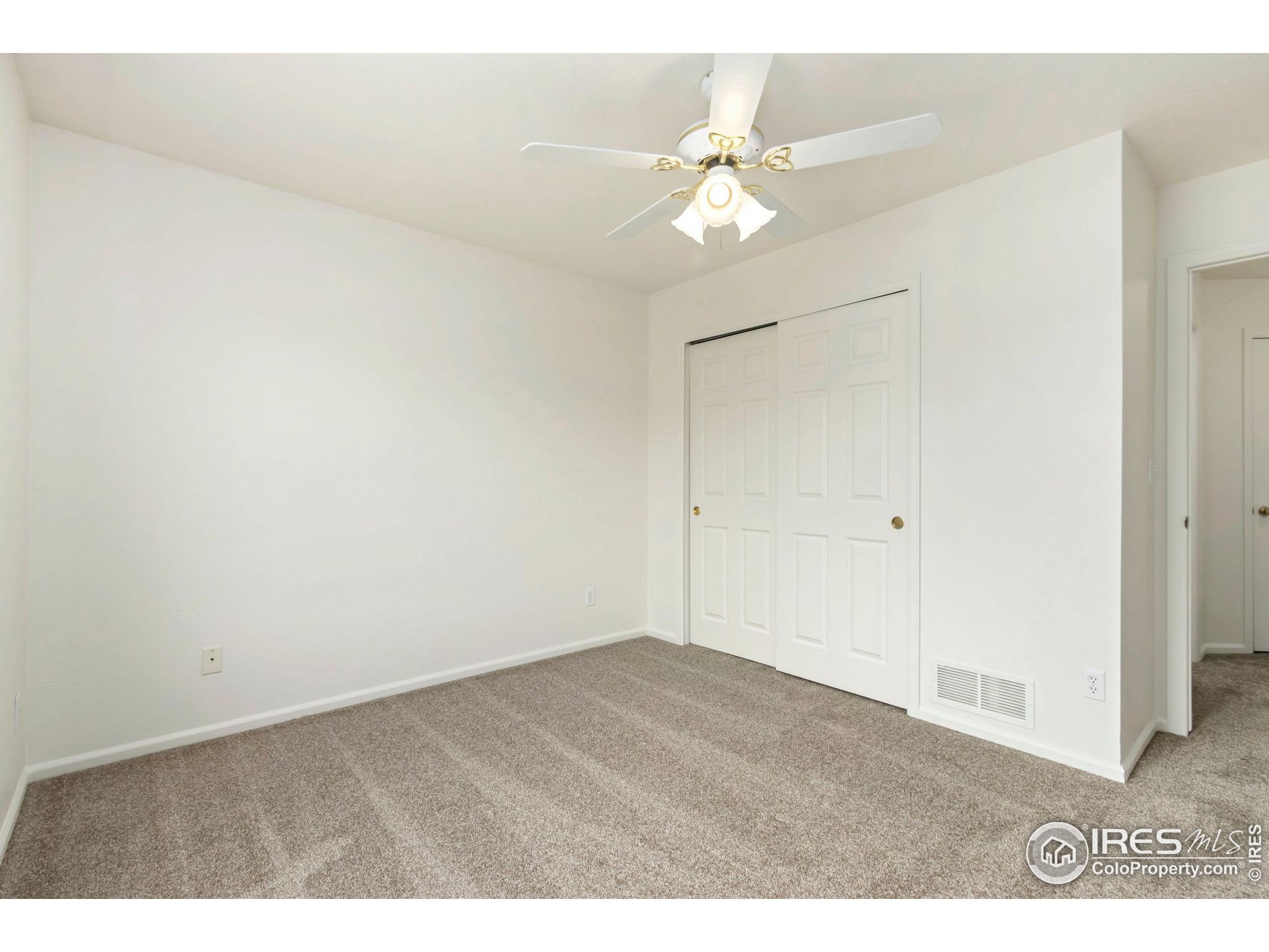 2925 West Stuart Street, Unit 11 Fort Collins, CO 80526 - Photo 17 of 34 a view of an empty room
