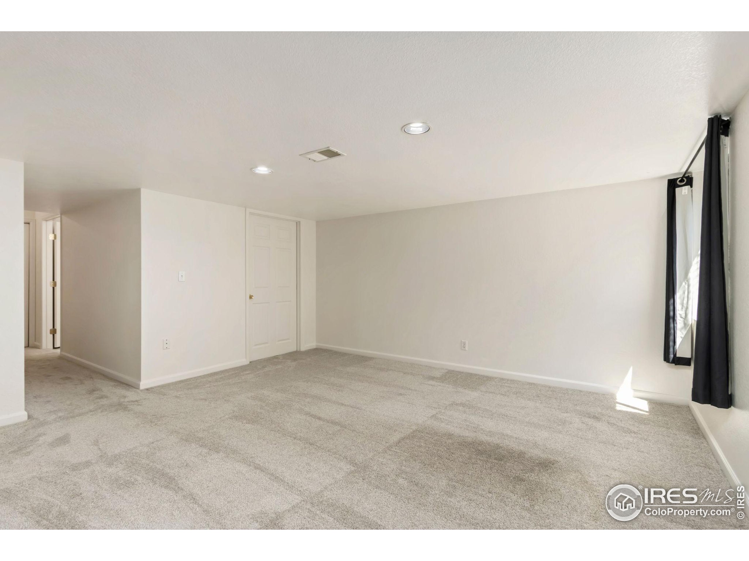 2925 West Stuart Street, Unit 11 Fort Collins, CO 80526 - Photo 28 of 34 a view of an empty room