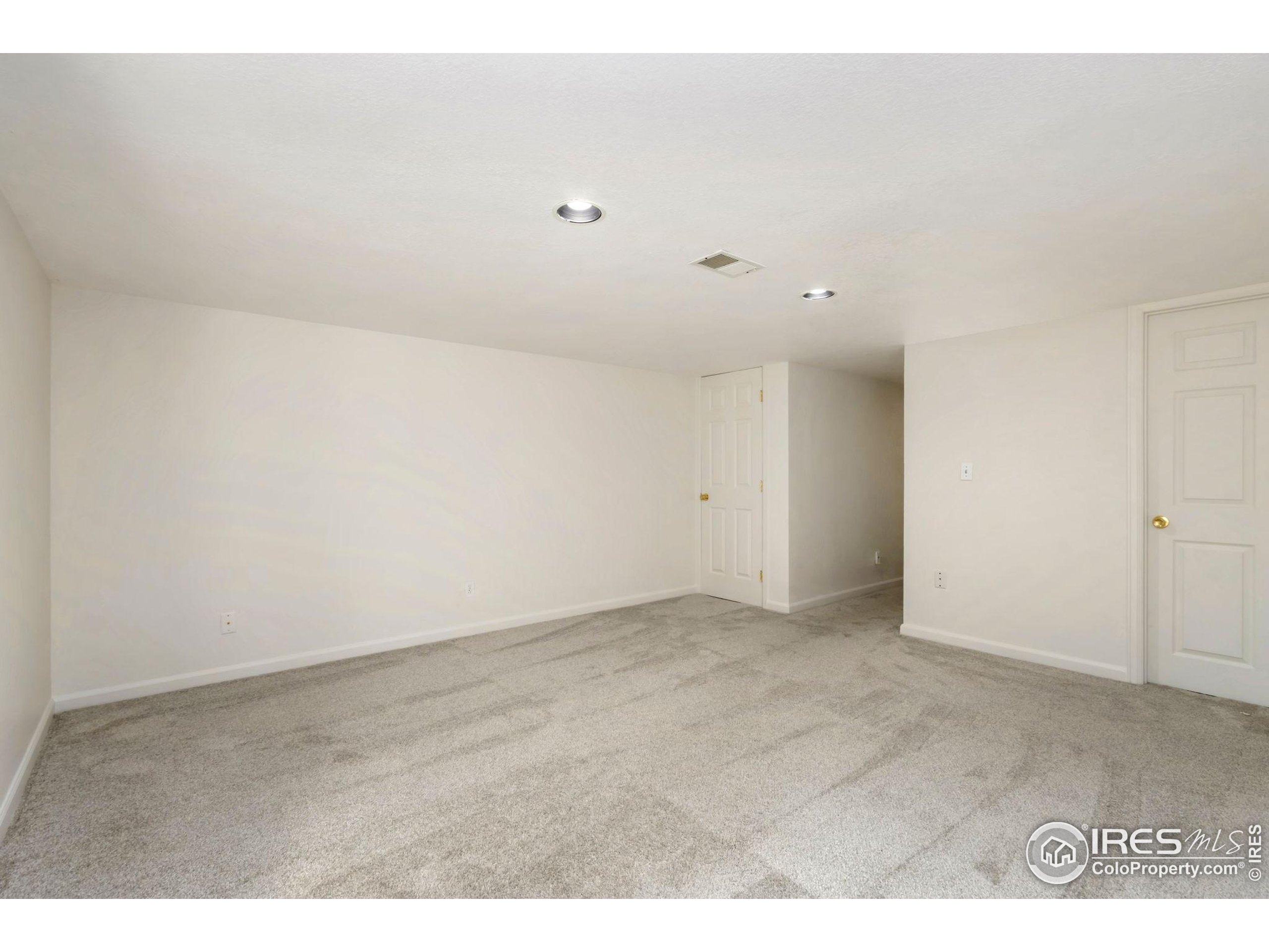 2925 West Stuart Street, Unit 11 Fort Collins, CO 80526 - Photo 29 of 34 a view of an empty room