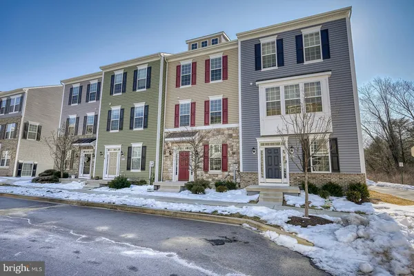 a front view of a building with street view