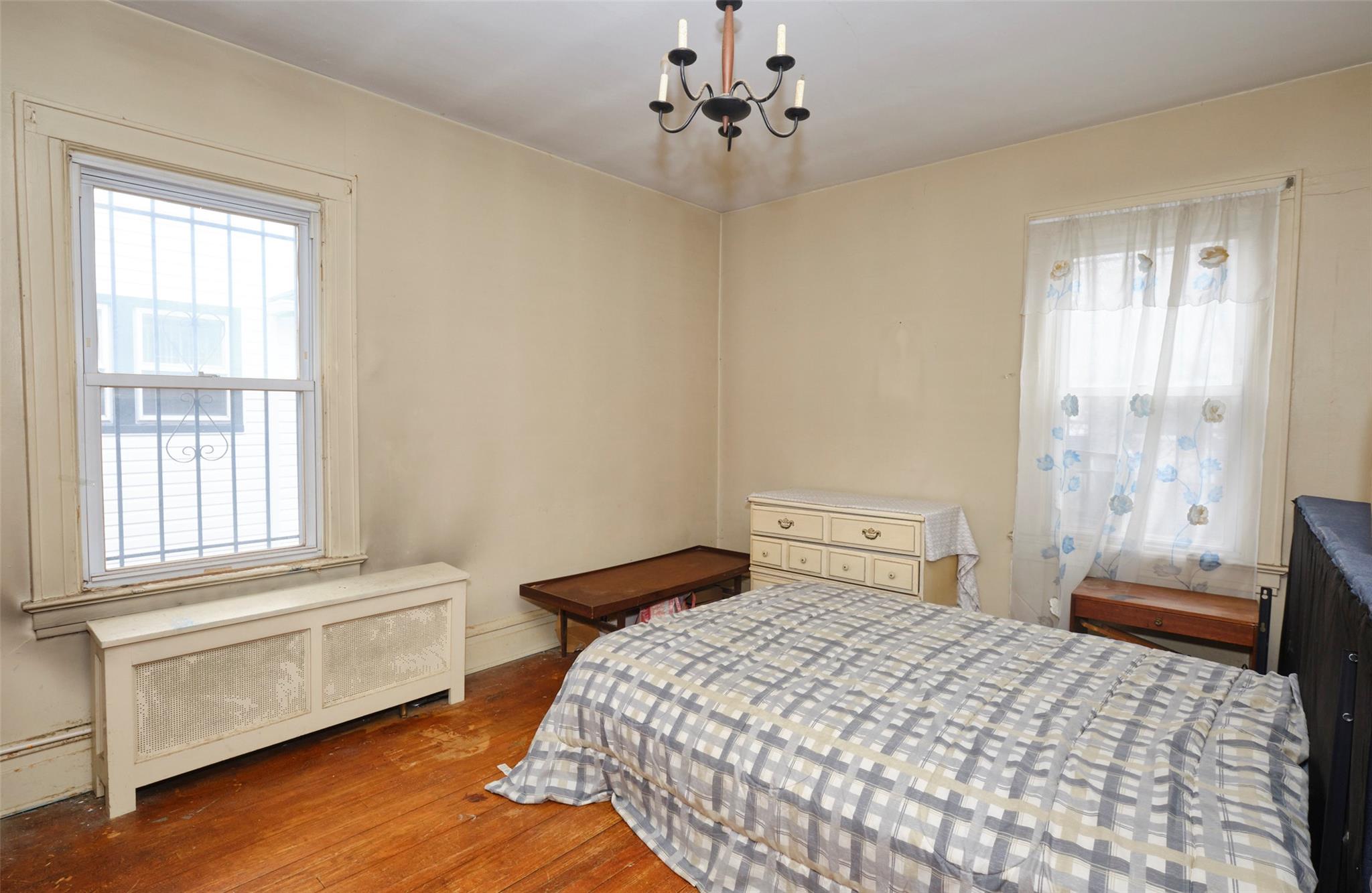 135-47 229th Street Queens, NY 11413 - Photo 17 of 36 Bedroom with baseboards, wood finished floors