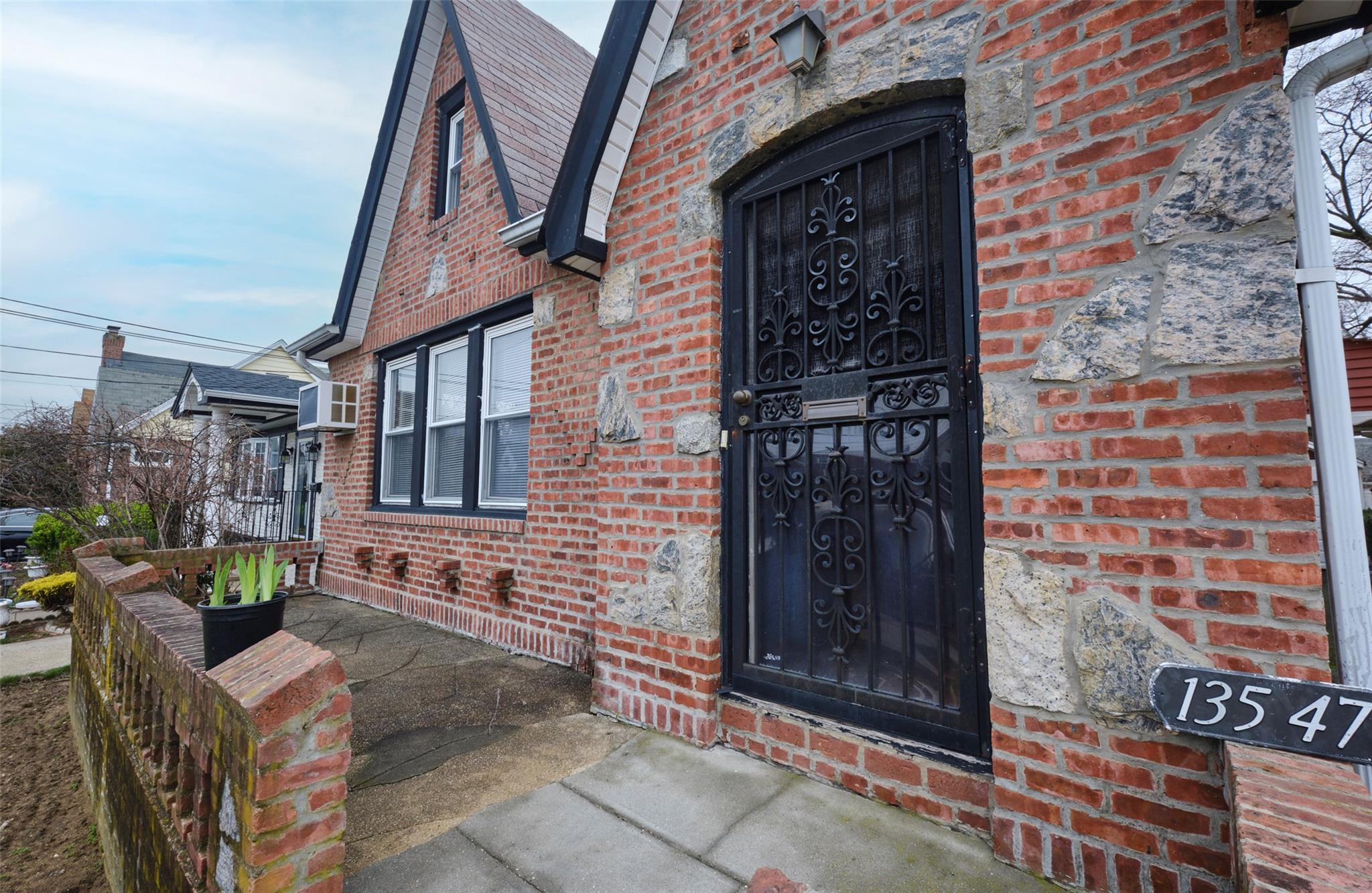 135-47 229th Street Queens, NY 11413 - Photo 2 of 36 Property entrance featuring brick siding