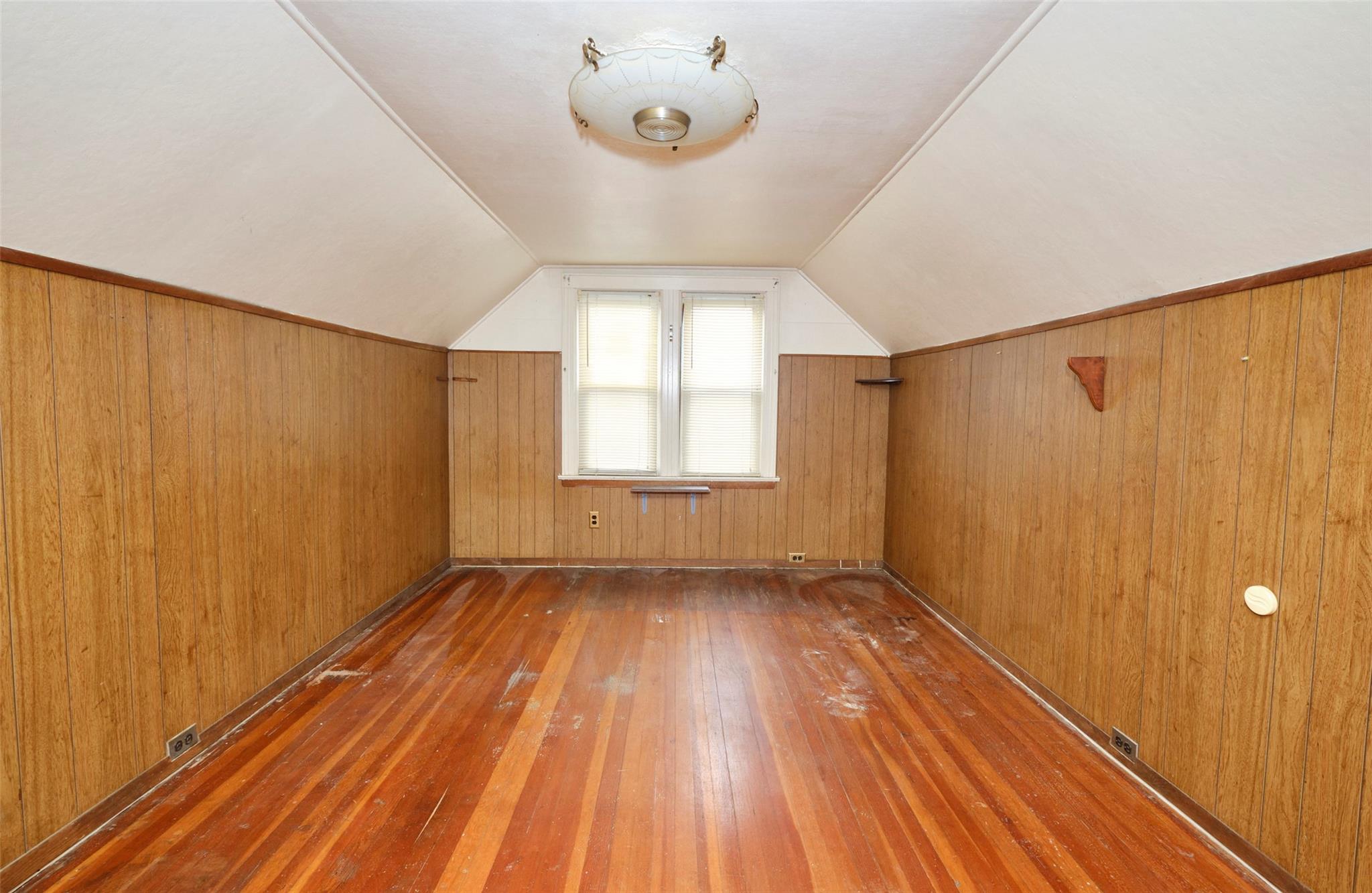 135-47 229th Street Queens, NY 11413 - Photo 23 of 36 Bonus room with hardwood / wood-style flooring and lofted ceiling