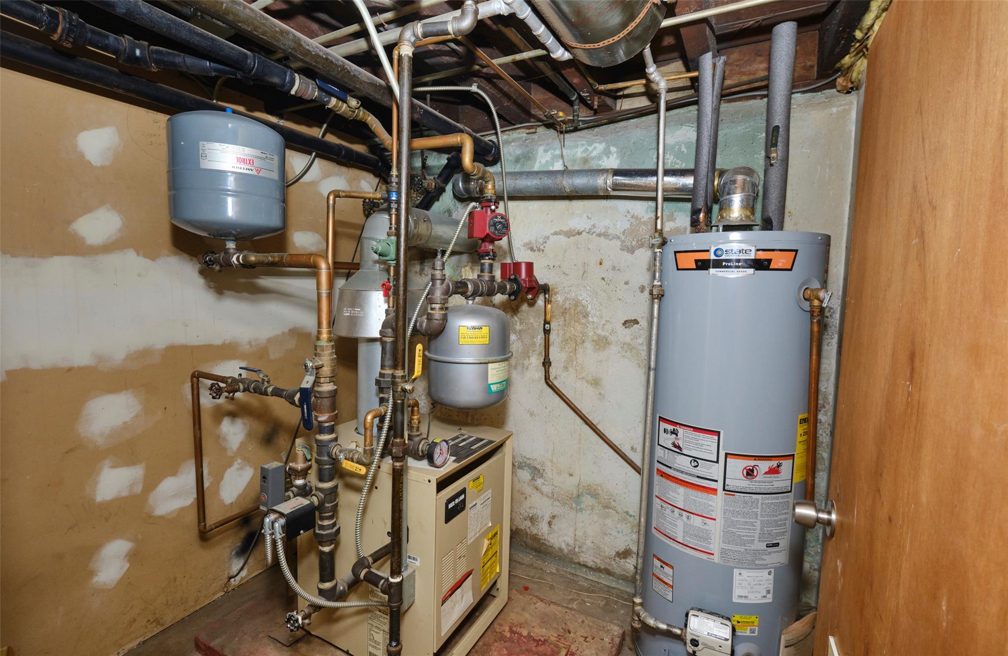 135-47 229th Street Queens, NY 11413 - Photo 30 of 36 Utilities with water heater and a heating unit