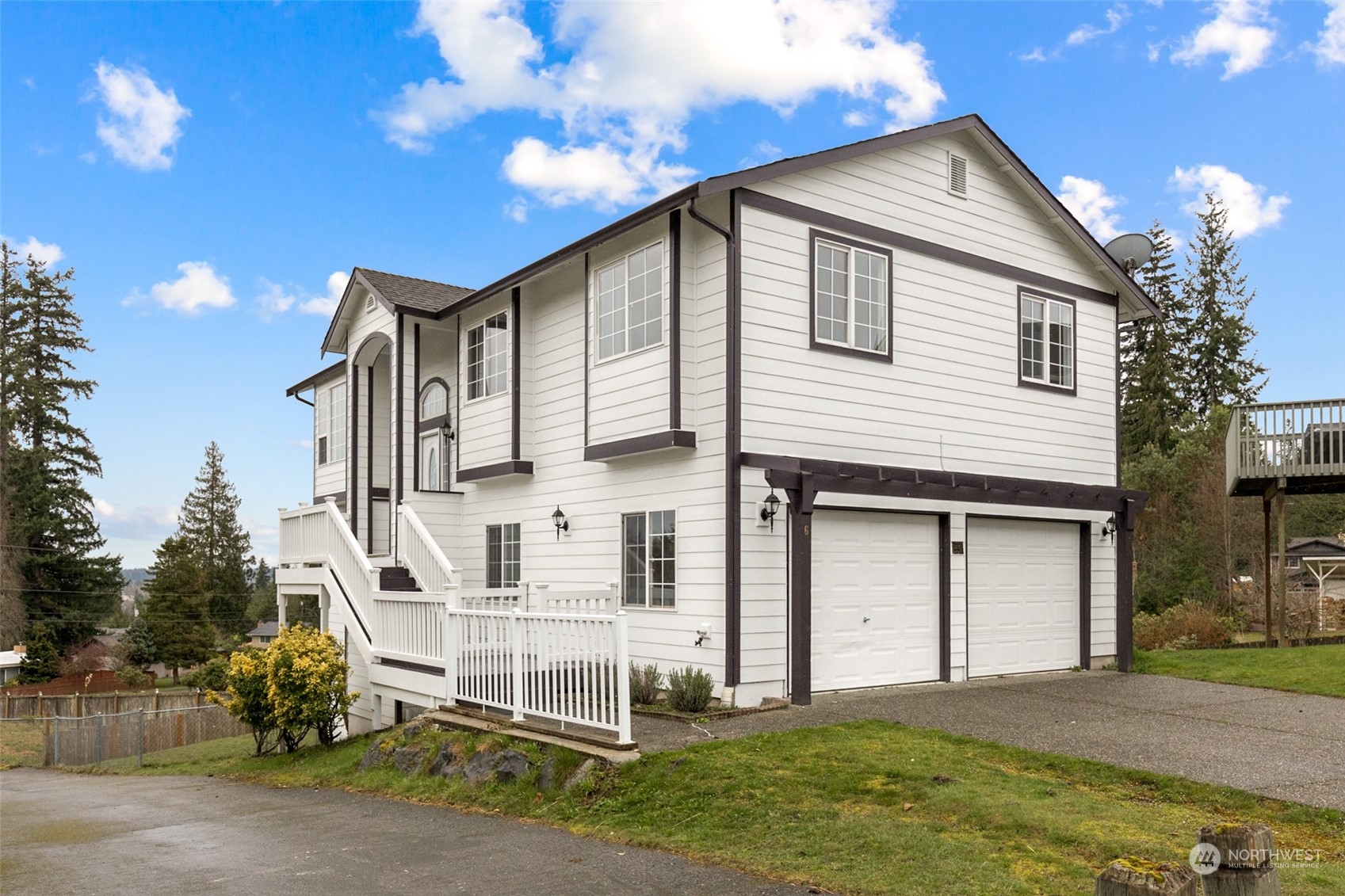 6 167th Place Southwest Bothell, WA 98012 - Photo 1 of 16 a view of house with yard and entertaining space