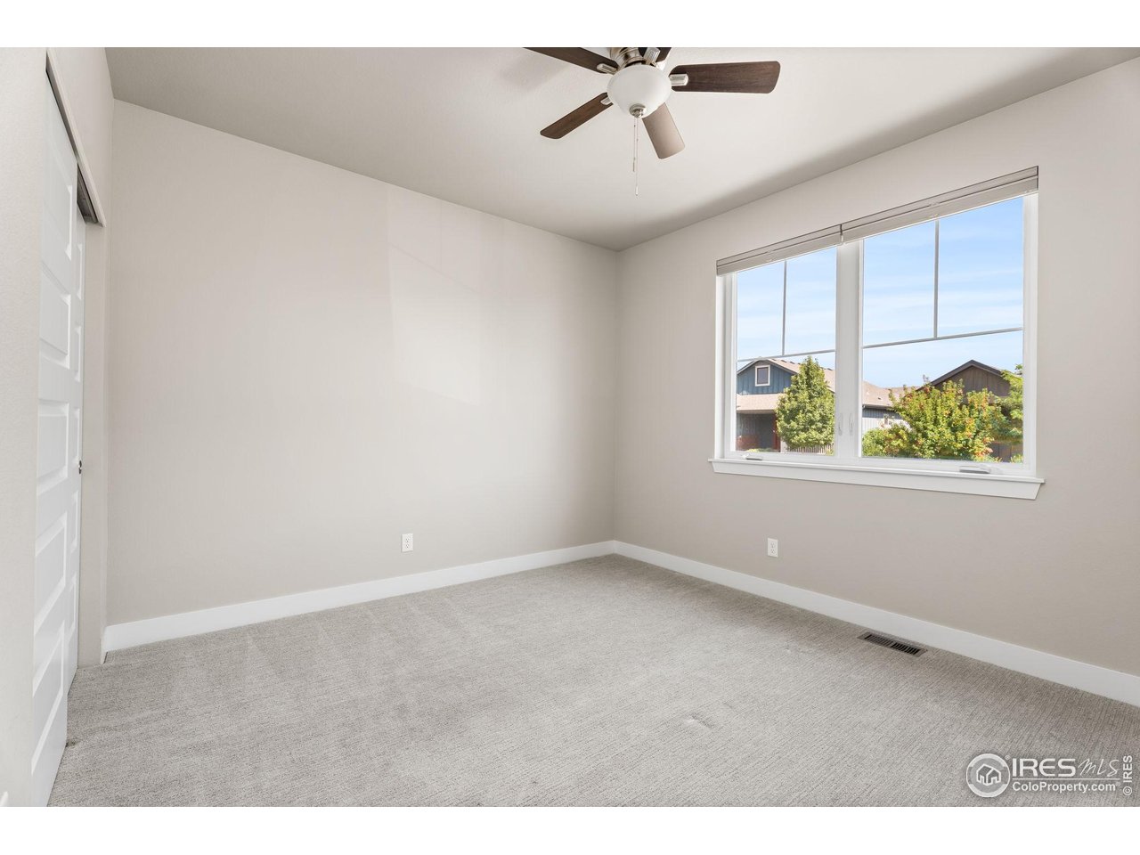 6977 Foxton Court Timnath, CO 80547 - Photo 25 of 32 a view of an empty room with a window