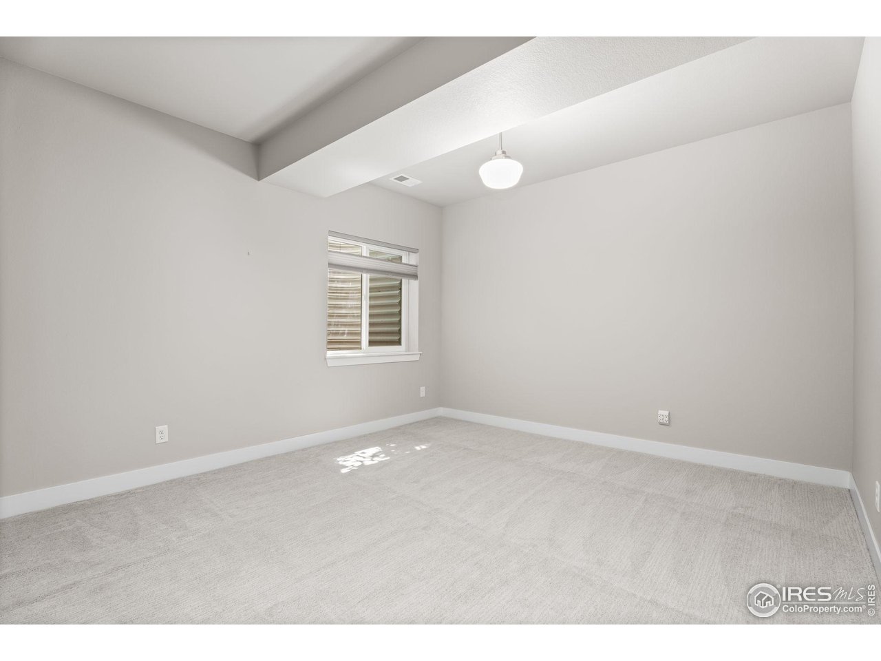 6977 Foxton Court Timnath, CO 80547 - Photo 30 of 32 an empty room with windows