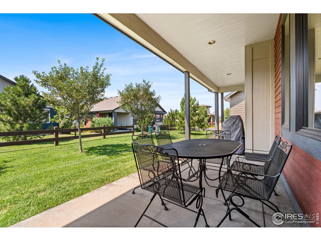 6977 Foxton Court Timnath, CO 80547 - Photo 31 of 32 a view of a chairs and table in the patio