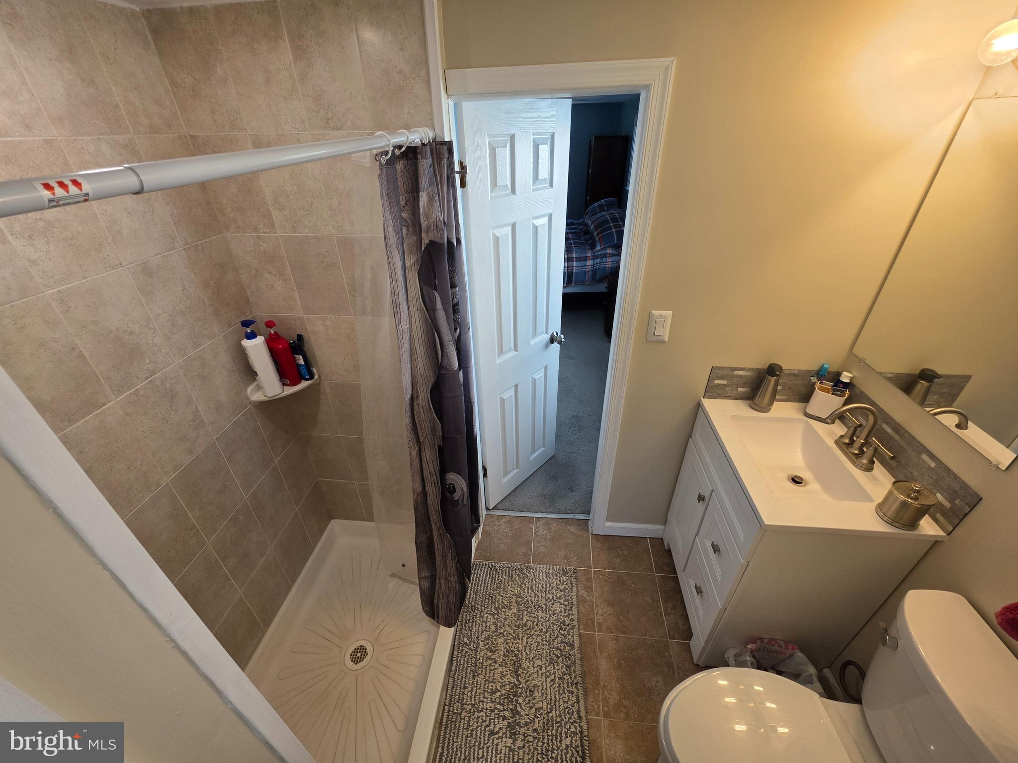 142 New Road Horsham, PA 19044 - Photo 23 of 38 a bathroom with a sink toilet and shower