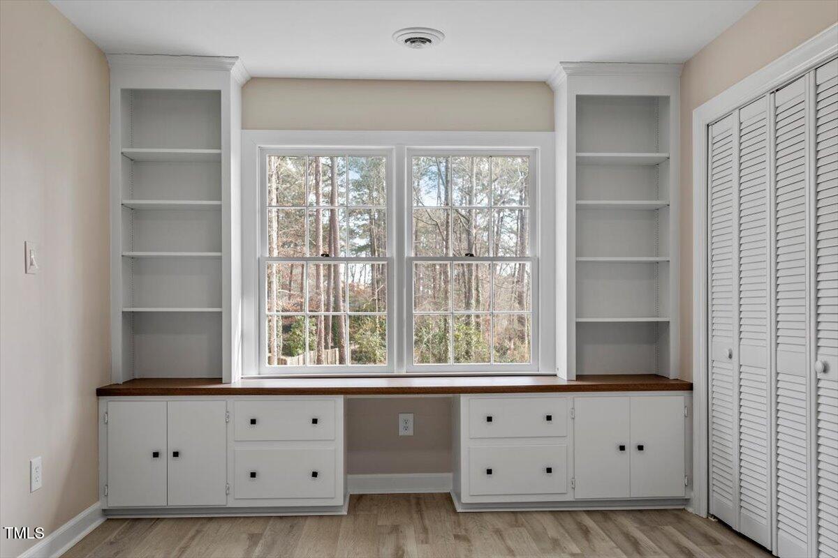 7300 Grist Mill Road Raleigh, NC 27615 - Photo 25 of 41 a view of an empty room with a window