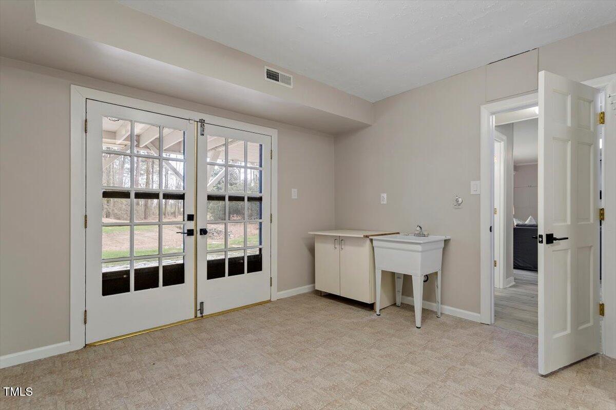 7300 Grist Mill Road Raleigh, NC 27615 - Photo 35 of 41 a view of an empty room with a window