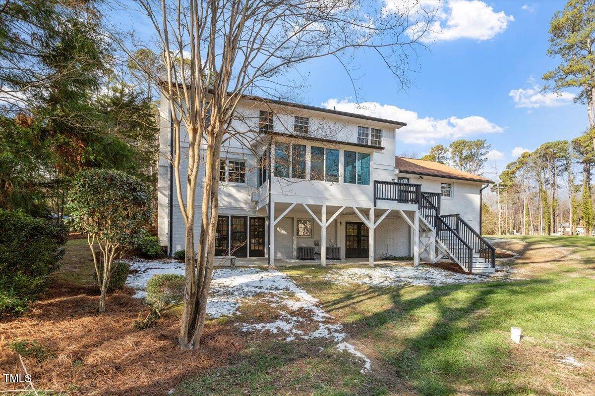 7300 Grist Mill Road Raleigh, NC 27615 - Photo 38 of 41 a view of a yard in front of house