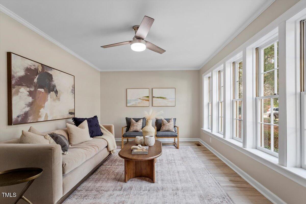 7300 Grist Mill Road Raleigh, NC 27615 - Photo 5 of 41 a living room with furniture and a large window
