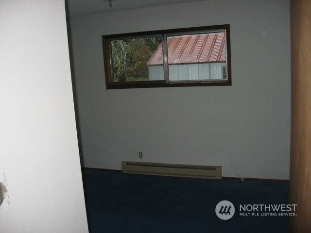 2466 North Shore Road Bellingham, WA 98226 - Photo 11 of 23 an empty room with a window