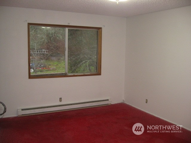 2466 North Shore Road Bellingham, WA 98226 - Photo 13 of 23 an empty room with a window