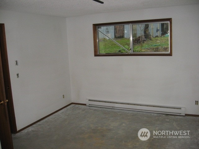 2466 North Shore Road Bellingham, WA 98226 - Photo 16 of 23 an empty room with a window