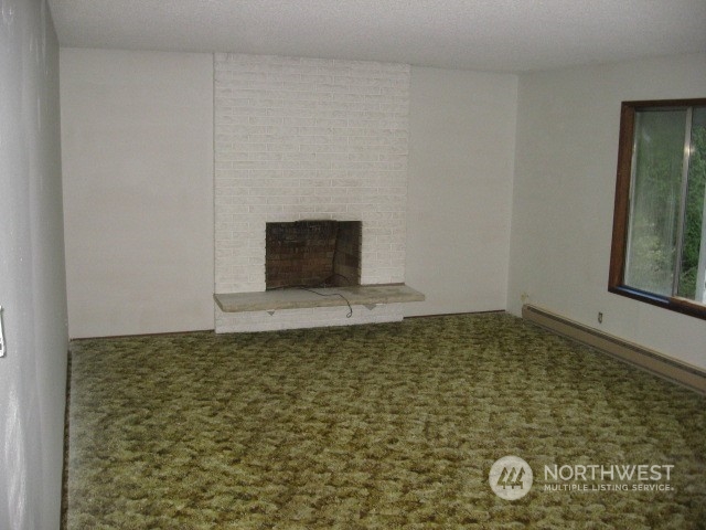 2466 North Shore Road Bellingham, WA 98226 - Photo 7 of 23 a view of a fireplace
