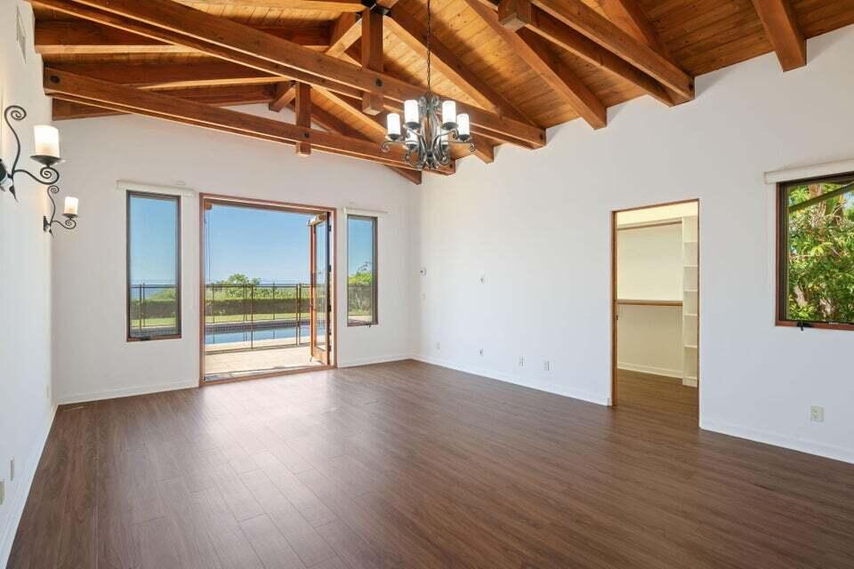 212 Alston Road Santa Barbara, CA 93108 - Photo 20 of 43 a view of an empty room with wooden floor and a window