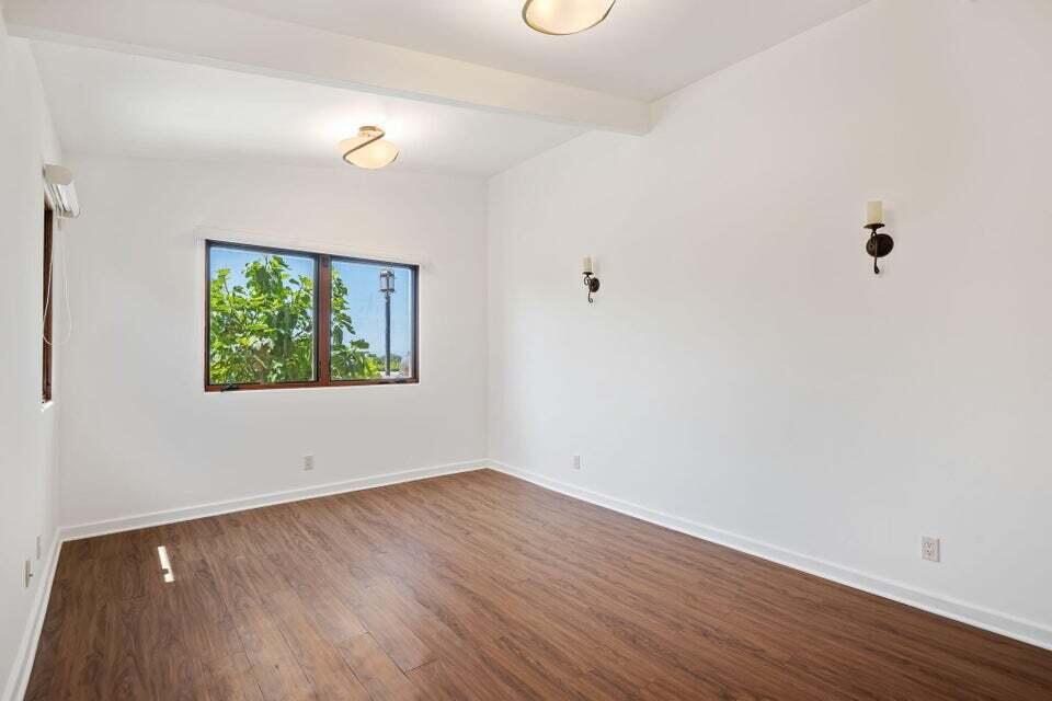 212 Alston Road Santa Barbara, CA 93108 - Photo 25 of 43 a view of empty room with wooden floor and fan