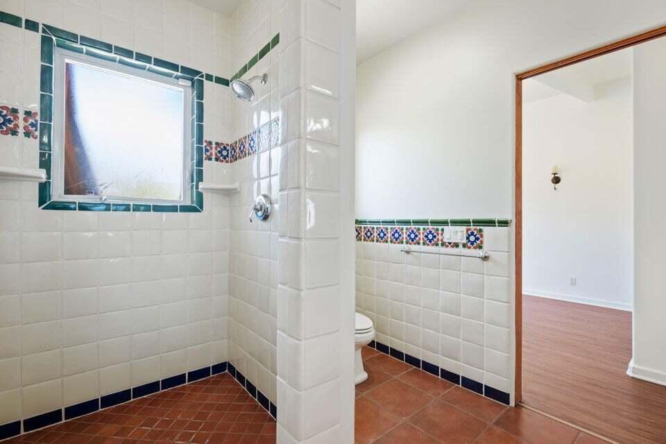 212 Alston Road Santa Barbara, CA 93108 - Photo 27 of 43 a bathroom with a shower and a window