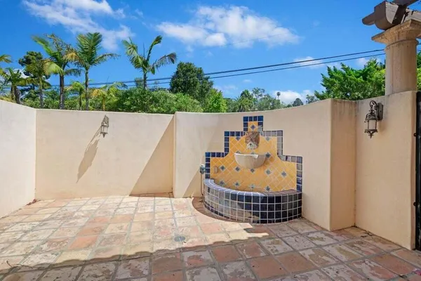 a view of balcony with furniture