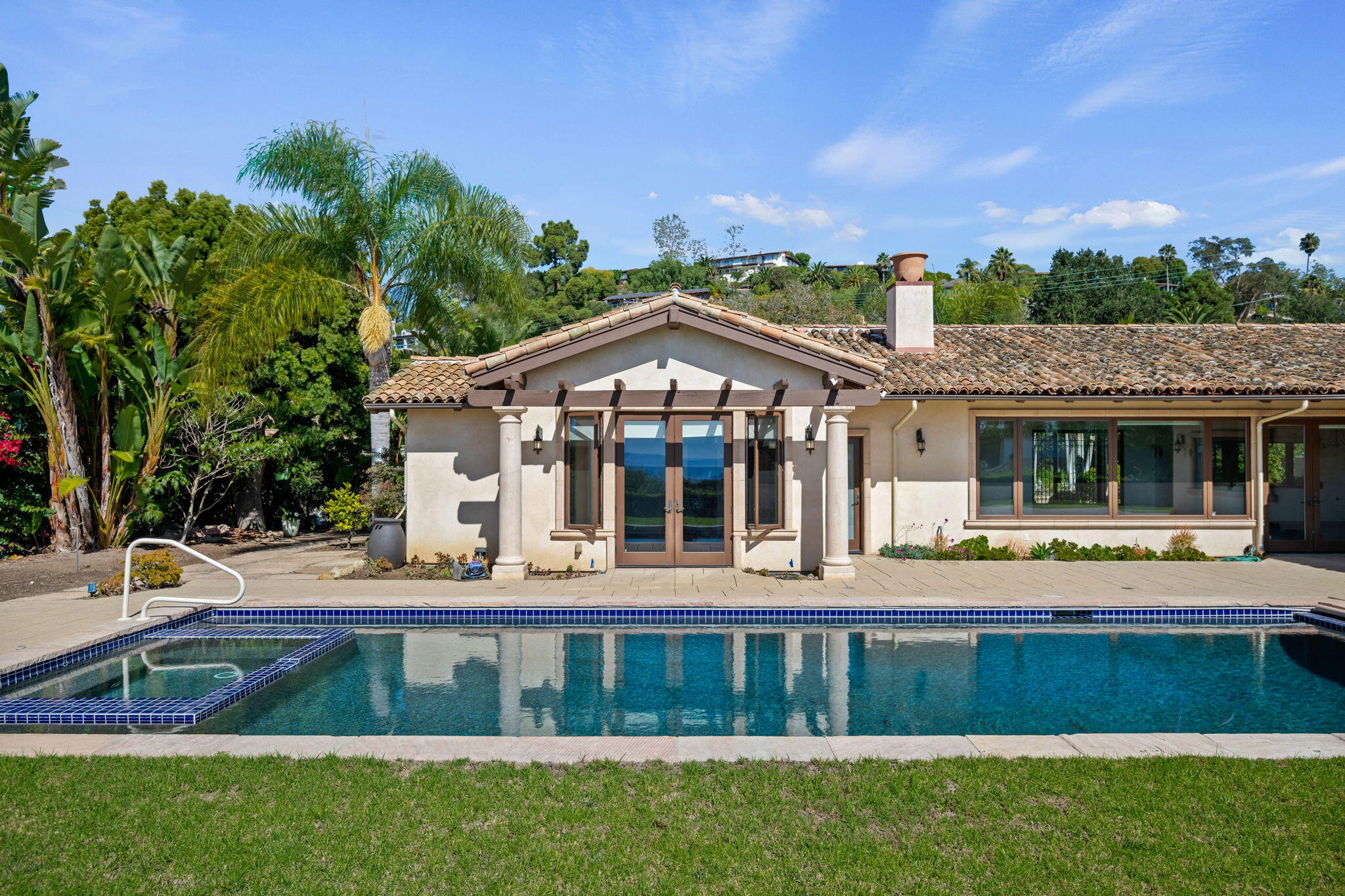 212 Alston Road Santa Barbara, CA 93108 - Photo 37 of 43 a front view of a house with a yard table and chairs