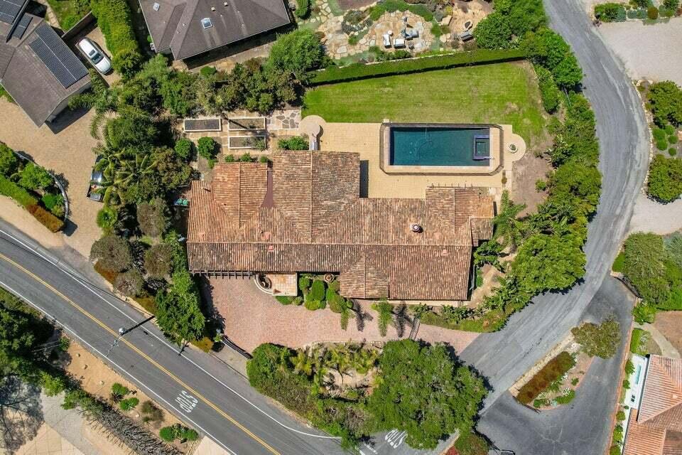 212 Alston Road Santa Barbara, CA 93108 - Photo 4 of 43 an aerial view of a house with a yard and pool