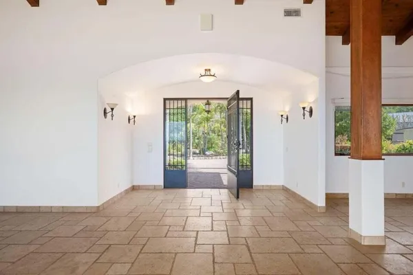 a view of entryway with a front door