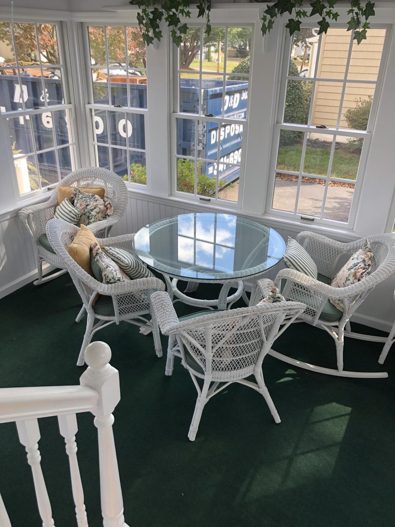 1111 Minnesink Road Manasquan, NJ 08736 - Photo 6 of 9 a living room with furniture and window
