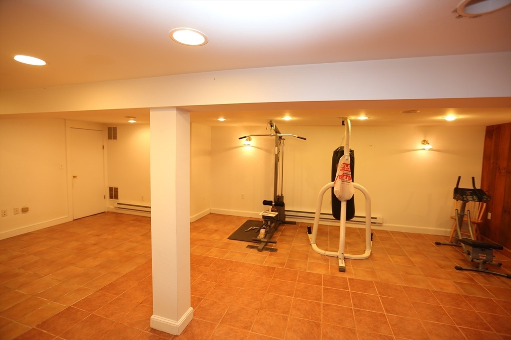 12 Lasell Street Boston, MA 02132 - Photo 13 of 22 a view of a room with gym equipment