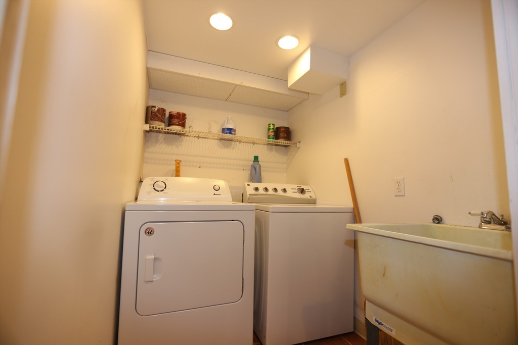 12 Lasell Street Boston, MA 02132 - Photo 16 of 22 a utility room with dryer and washer