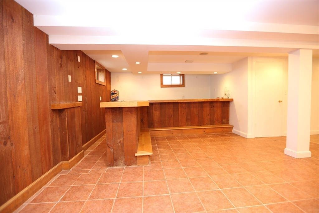 12 Lasell Street Boston, MA 02132 - Photo 17 of 22 a view of a hall with wooden floor