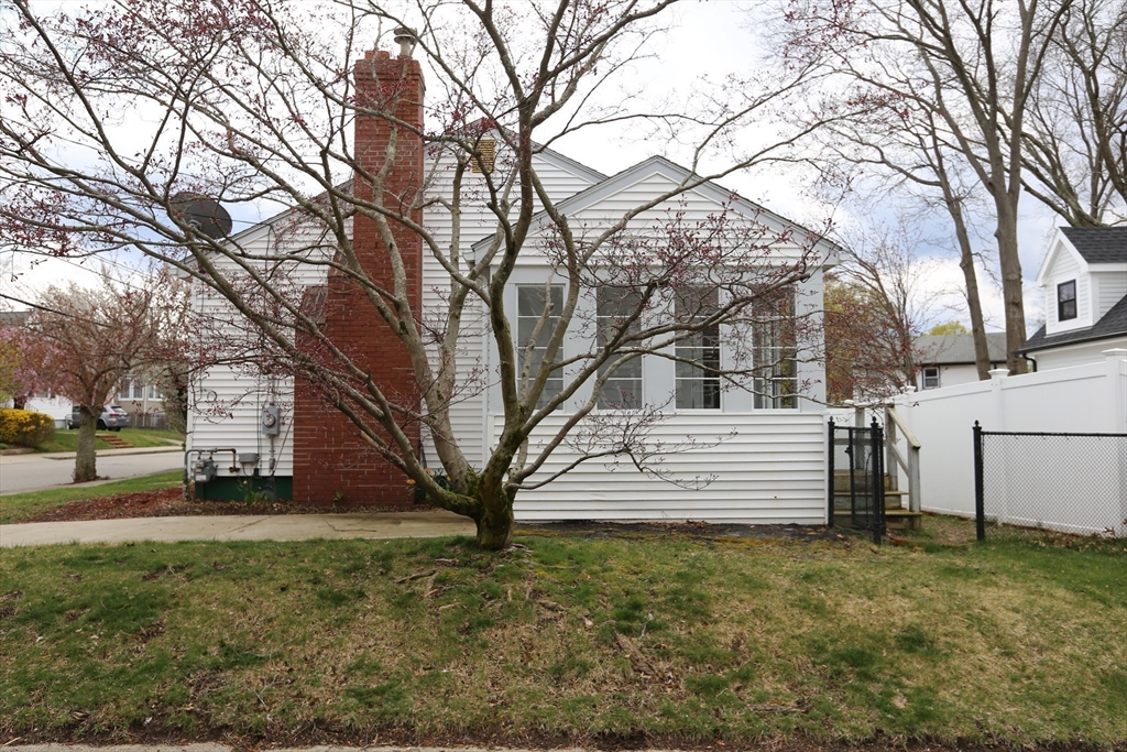 12 Lasell Street Boston, MA 02132 - Photo 20 of 22 a view of house with yard
